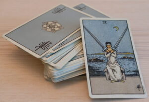 Tarot Deck Two of Swords scaled e1701571370573 300x205 - Your Weekly Horoscope December 4th through 10th